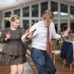 A couple dancing at a wedding reception.