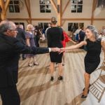 A couple dancing at a wedding reception.