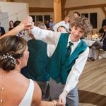 A couple dancing at their wedding reception.