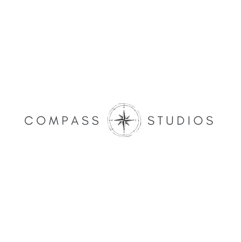 Compass Studios logo on a white background.