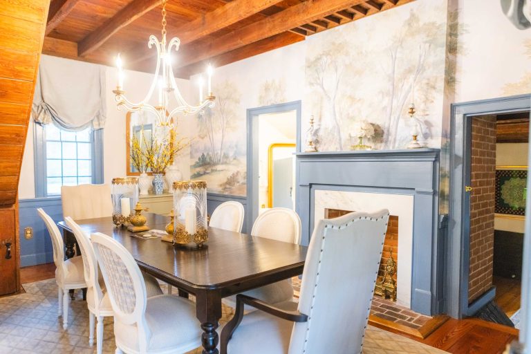 A Pleasant Hill House with a blue-walled dining room featuring a fireplace.