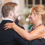 A man and woman sharing a dance at a wedding reception held at Savage Mill.