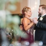 A couple showcasing their elegant moves on the dance floor during their Savage Mill wedding reception.