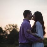 Engagement Photos of a couple kissing at sunset in Maryland.