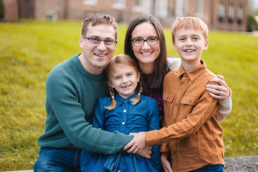 A Family posing for a photo in front of Belair Mansion, Bowie Maryland.